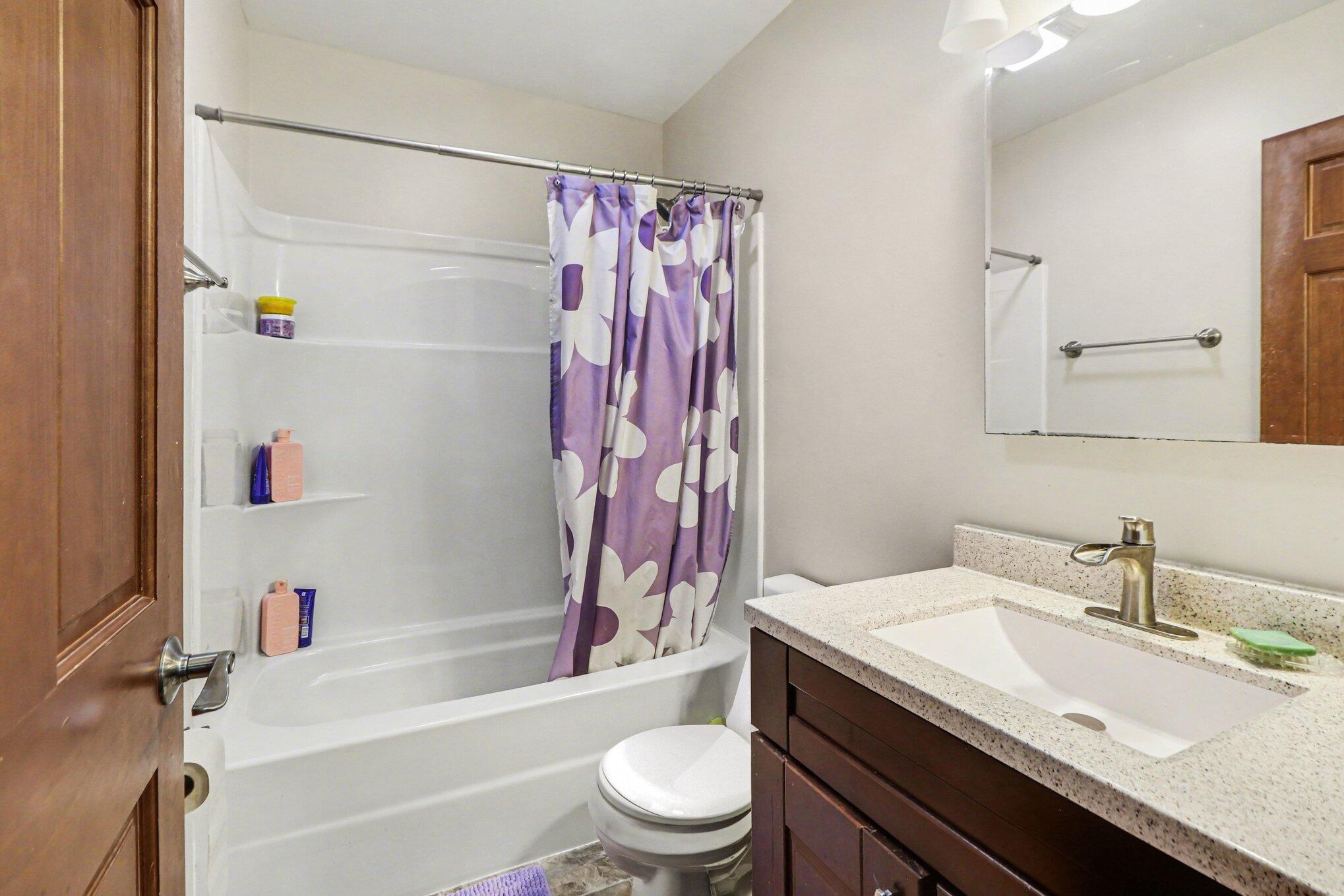 190 East Mekeland Road Chesterton, IN 46304 - Photo 17 of 29 a bathroom with a sink a toilet and a bathtub