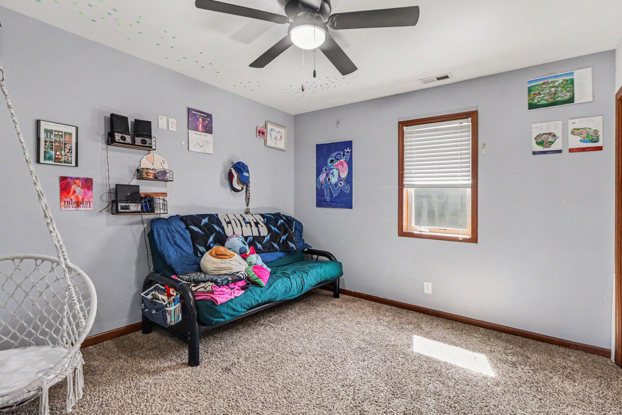 190 East Mekeland Road Chesterton, IN 46304 - Photo 18 of 29 a living room with baby bed furniture and a window