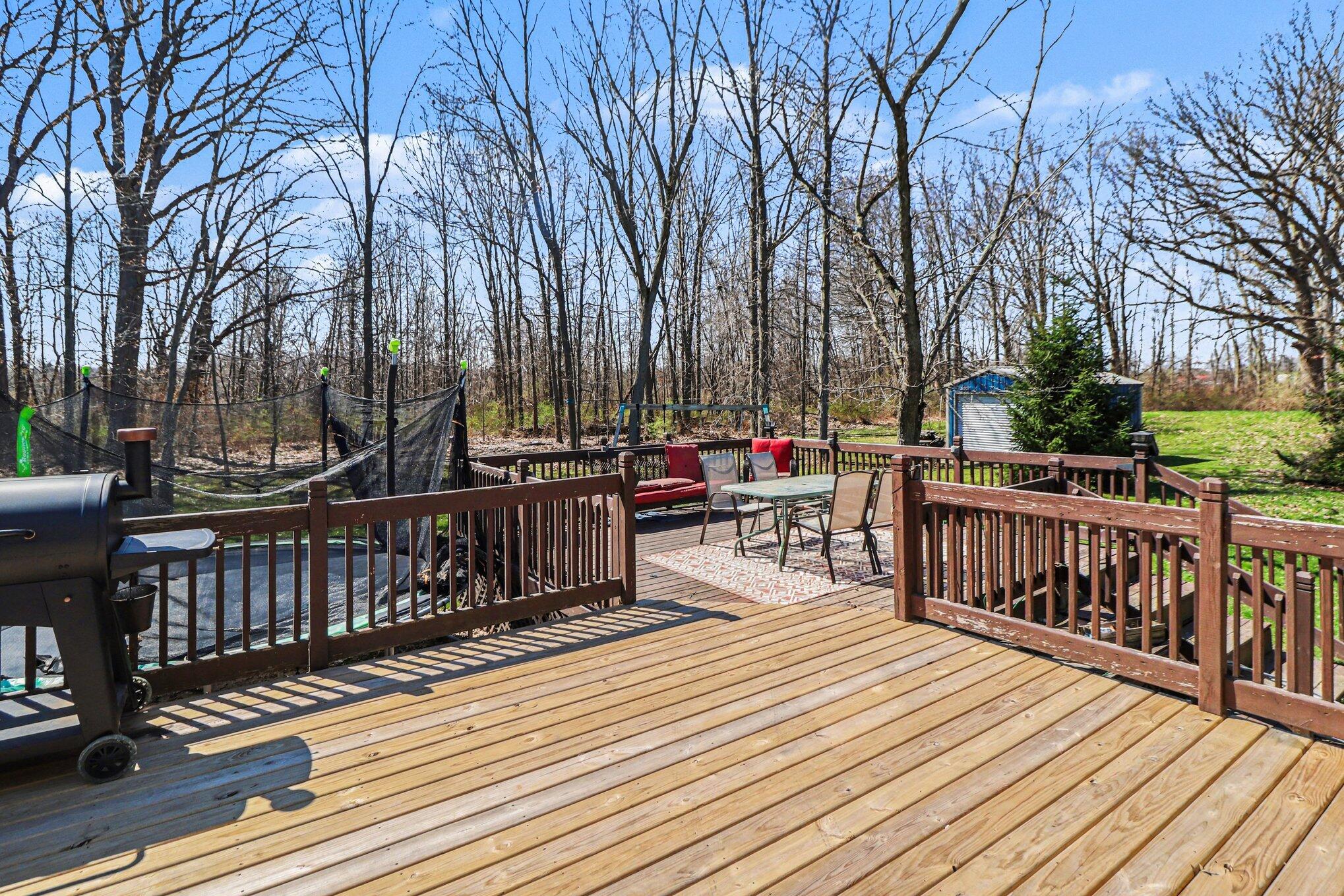 190 East Mekeland Road Chesterton, IN 46304 - Photo 23 of 29 a view of a deck with chairs and wooden floor