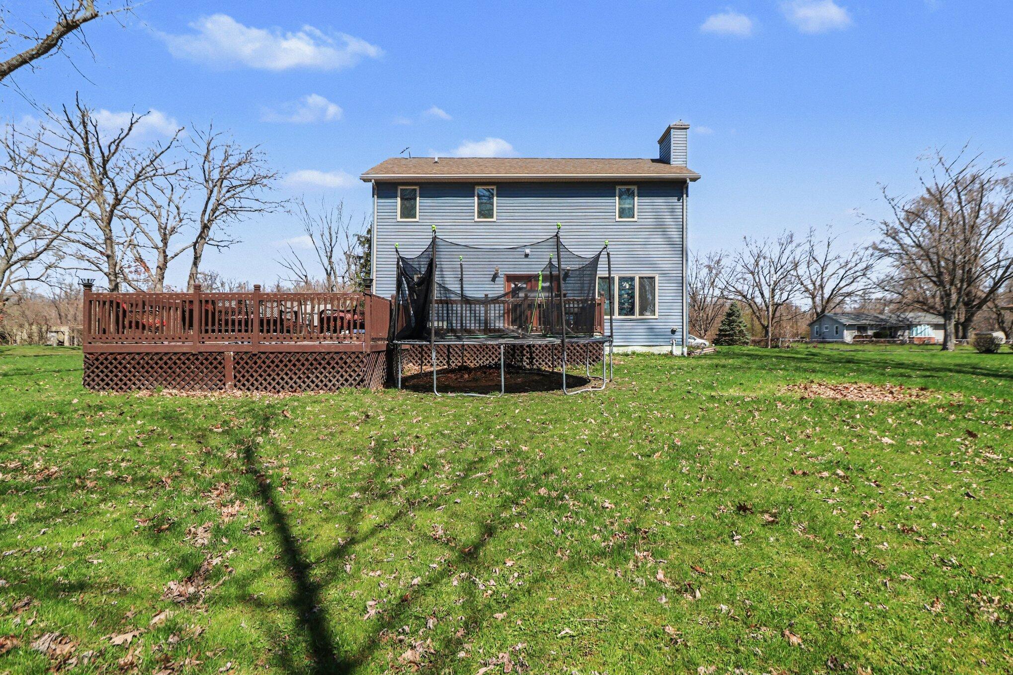 190 East Mekeland Road Chesterton, IN 46304 - Photo 25 of 29 a front view of a house with garden