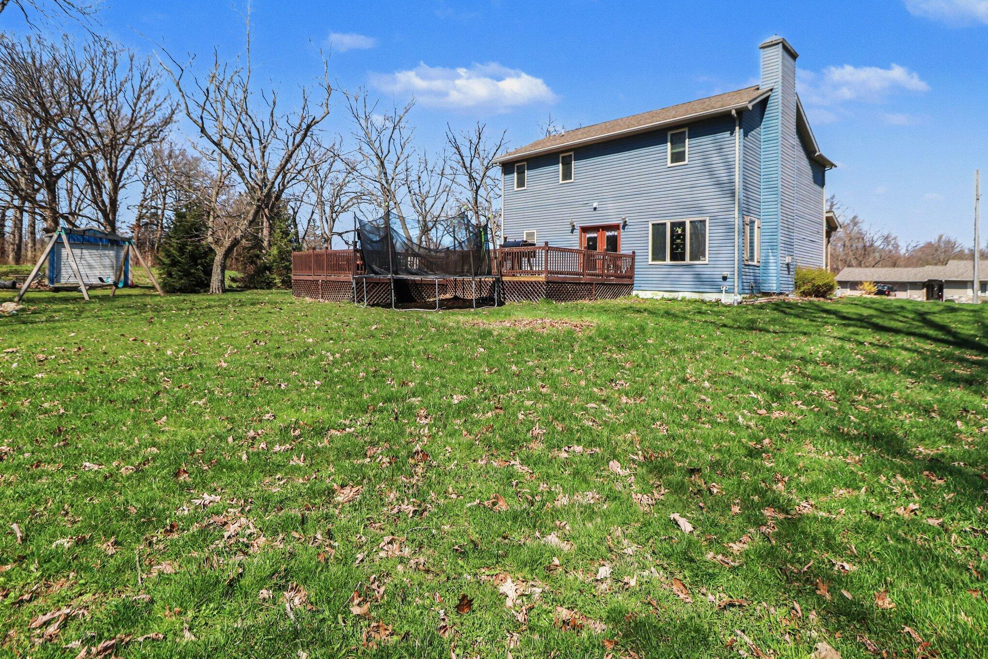 190 East Mekeland Road Chesterton, IN 46304 - Photo 26 of 29 a view of a house with backyard and a tree