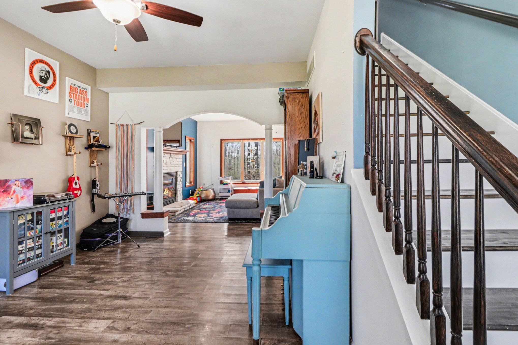 190 East Mekeland Road Chesterton, IN 46304 - Photo 4 of 29 a living room with furniture and a chandelier