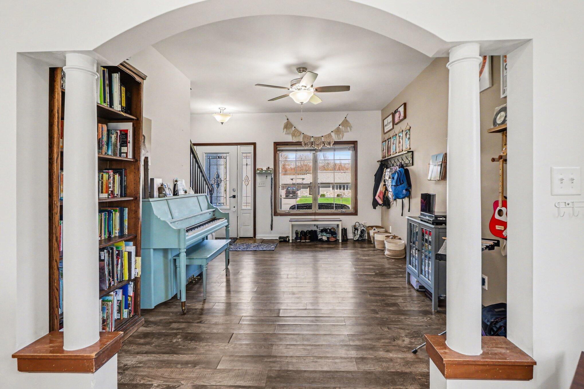 190 East Mekeland Road Chesterton, IN 46304 - Photo 5 of 29 a living room with lots of furniture and a book shelf