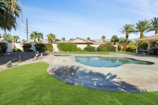 a view of a lake with a yard