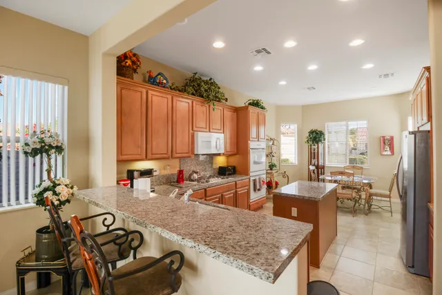 a view of a living room and dining room