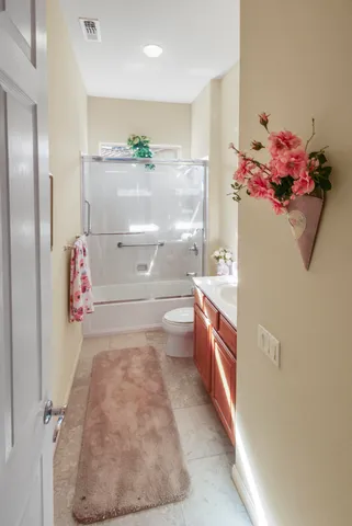 a view of kitchen with a refrigerator