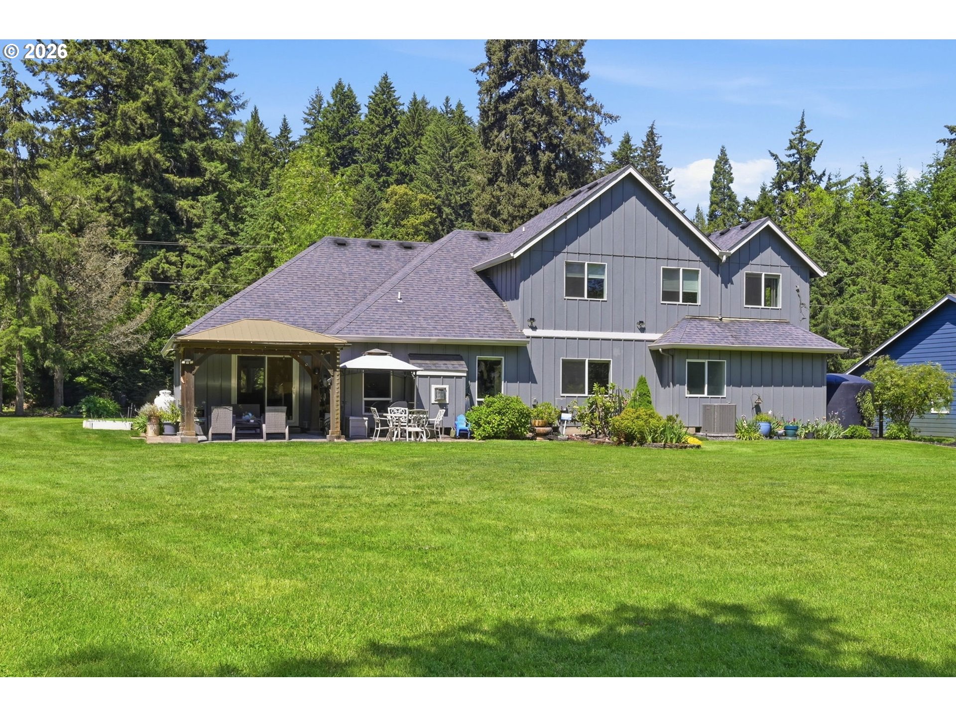 29778 Gimpl Hill Road Eugene, OR 97405 - Photo 34 of 43 a front view of a house with a yard