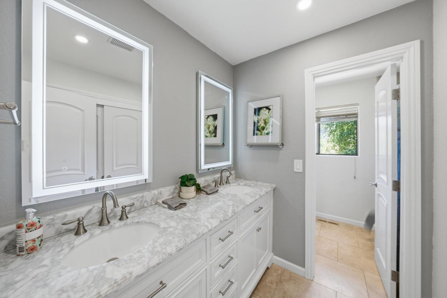 701 Day Valley Road Aptos, CA 95003 - Photo 24 of 43 a bathroom with a granite countertop sink and a mirror