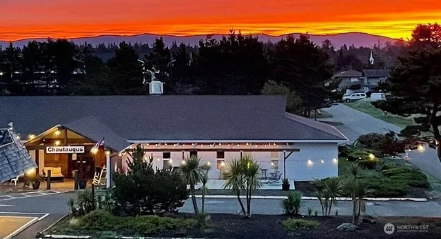 an outdoor view of house with green space