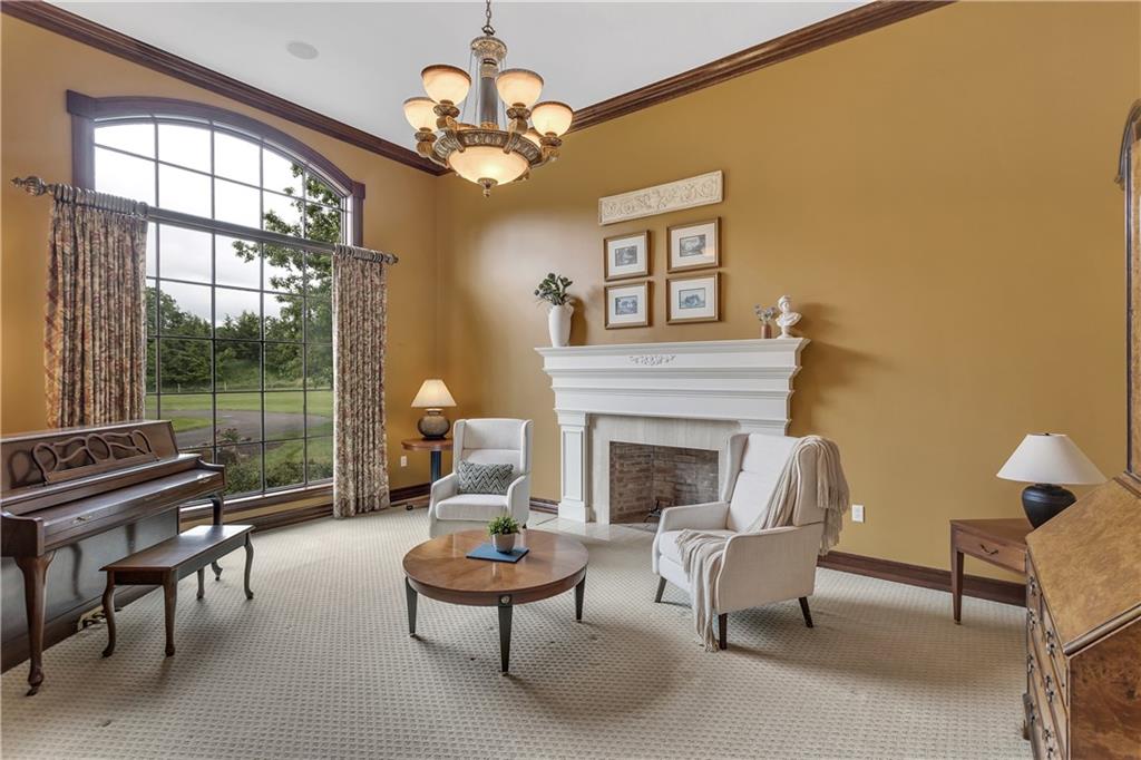 39 Caven Road Ligonier, PA 15658 - Photo 7 of 33 Gas-start wood-burning fireplace in the light and bright Living Room