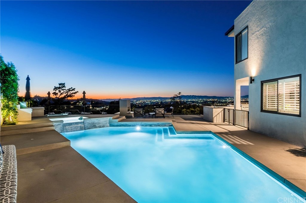 3105 Dona Sofia Drive Studio City, CA 91604 - Photo 44 of 45 a view of a swimming pool and lounge chair