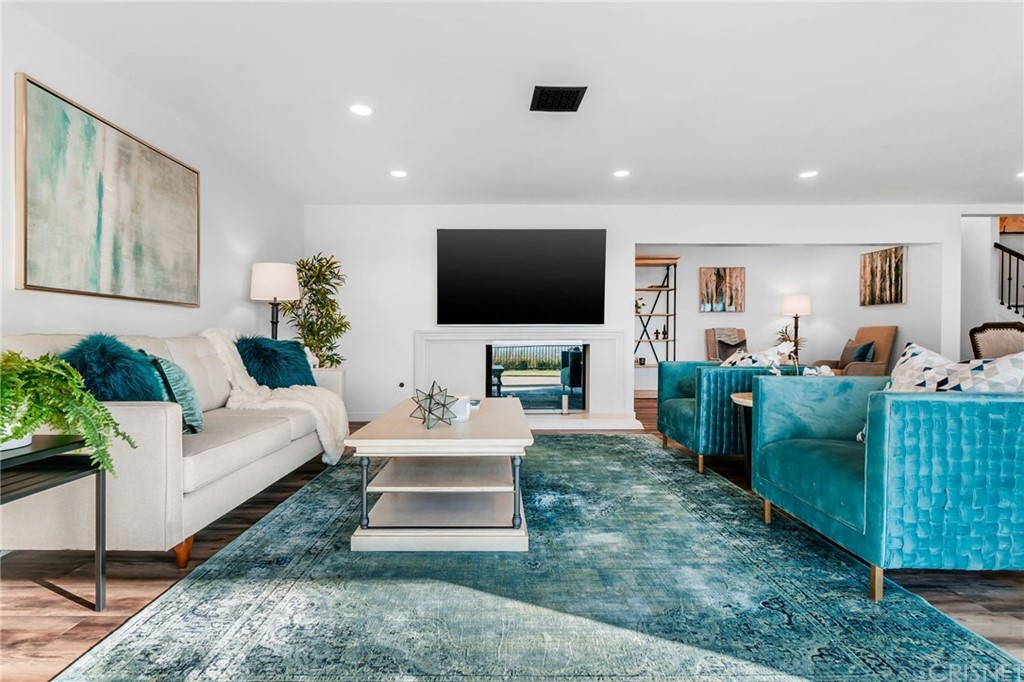 3105 Dona Sofia Drive Studio City, CA 91604 - Photo 7 of 45 a living room with furniture and a flat screen tv