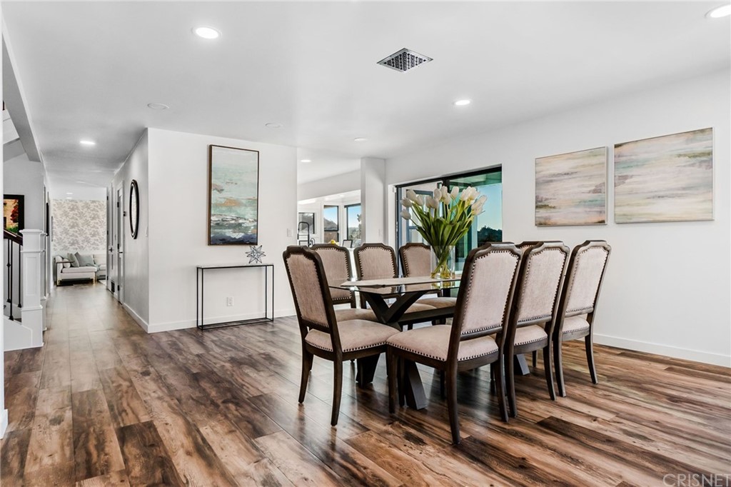 3105 Dona Sofia Drive Studio City, CA 91604 - Photo 10 of 45 a view of a dining room with furniture and wooden floor