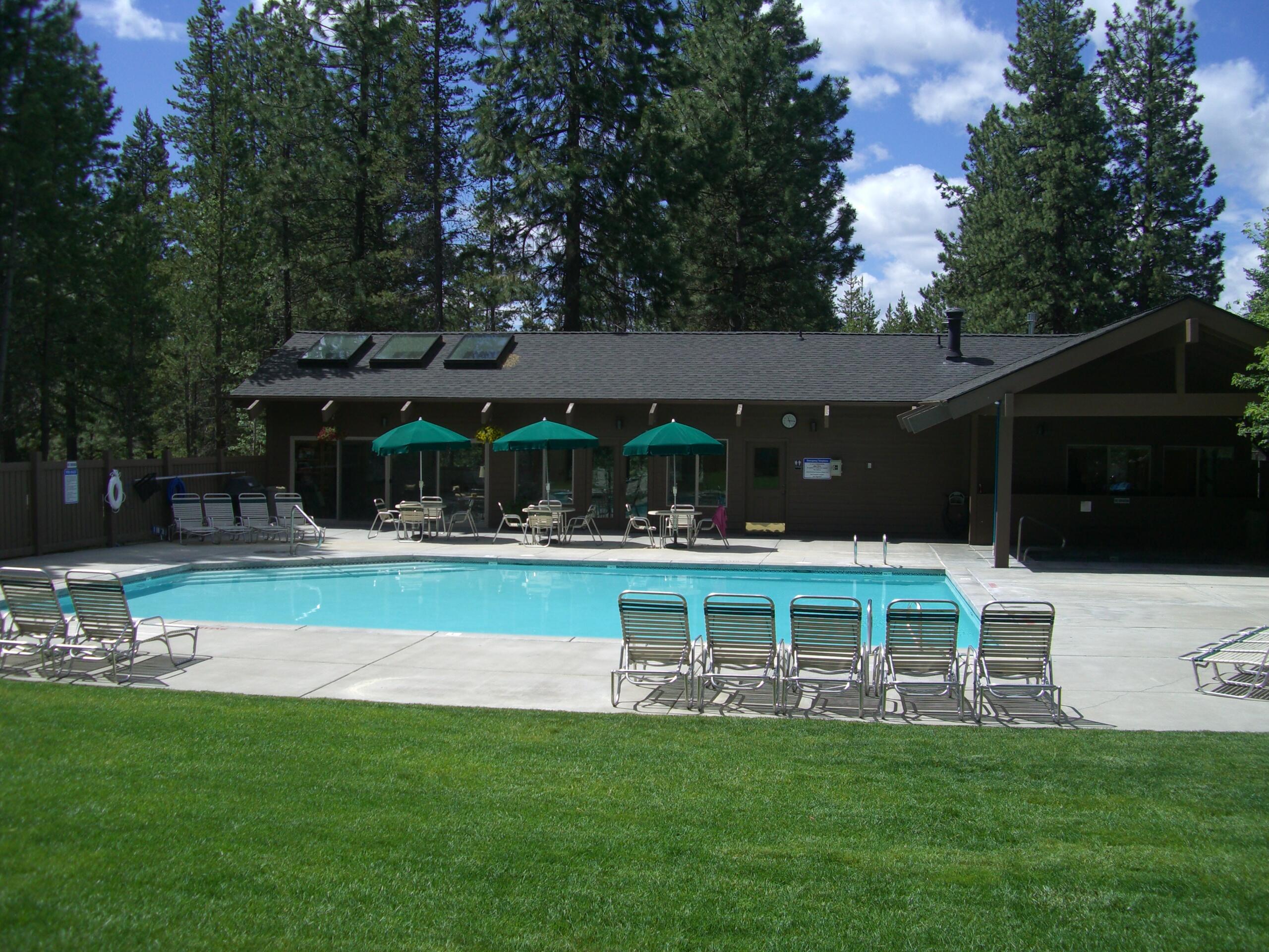 57395-40a1 Beaver Ridge Loop Sunriver, OR 97707 - Photo 21 of 26 a view of a house with a yard