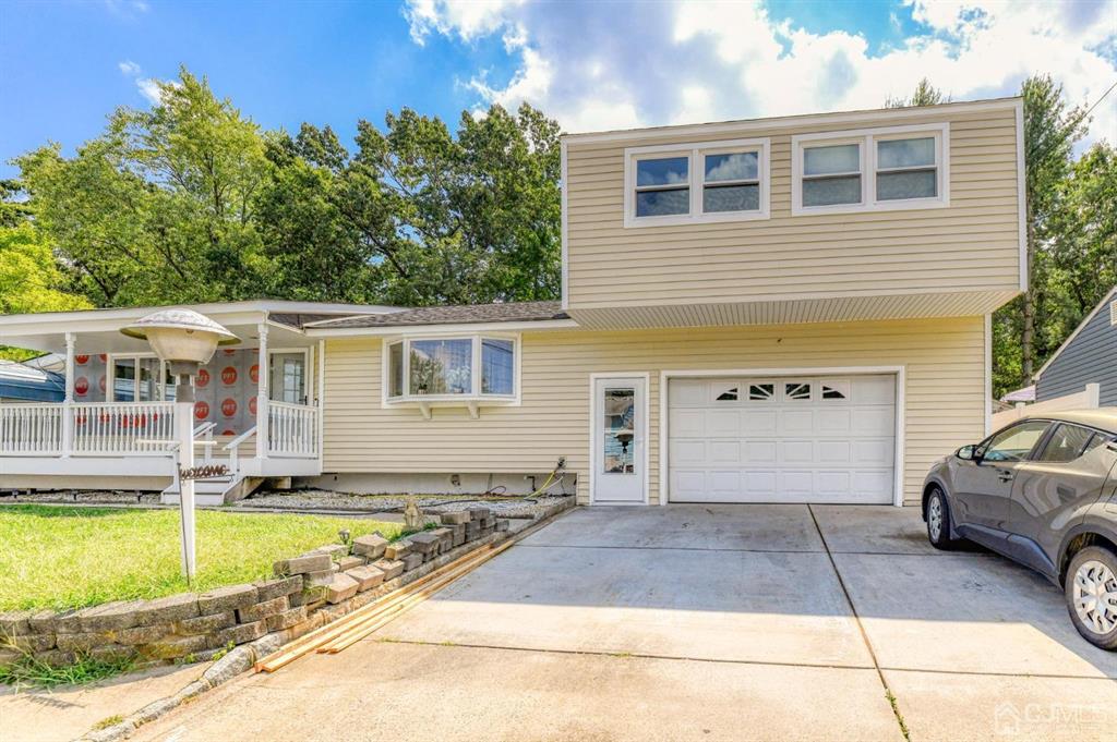 22 Baker Drive Helmetta, NJ 08828 - Photo 15 of 15 a view of a house with swimming pool in front of it