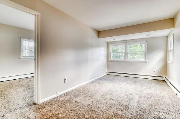 an empty room with windows