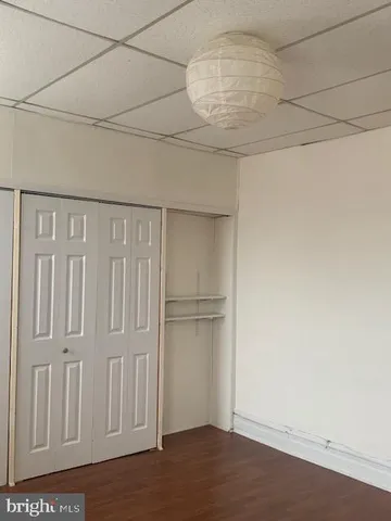 a view of a livingroom with wooden floor