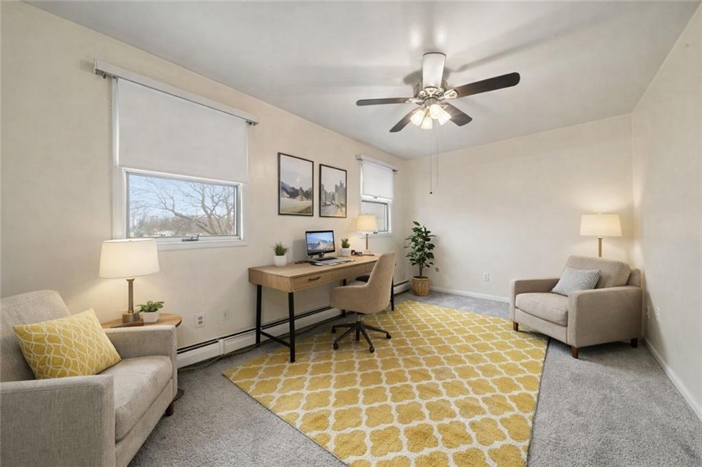 255 Poplar Street Monroeville, PA 15146 - Photo 35 of 50 a living room with furniture and a chandelier