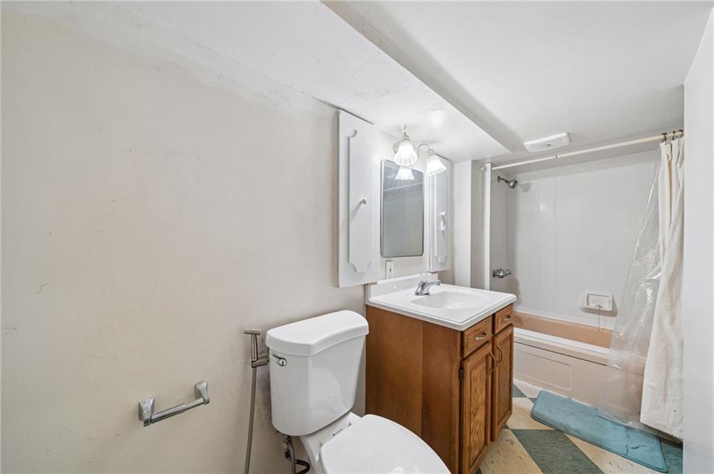 255 Poplar Street Monroeville, PA 15146 - Photo 40 of 50 a bathroom with a sink toilet vanity and shower