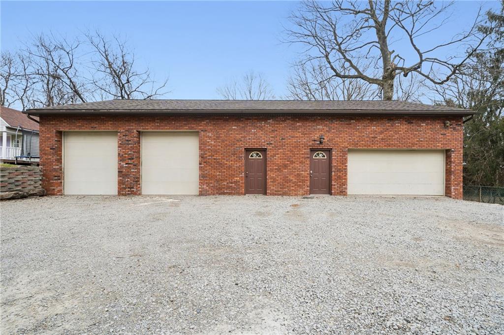 255 Poplar Street Monroeville, PA 15146 - Photo 4 of 44 Expansive five car garage with soaring ceilings that provides room for vehicles, equipment, and all the motorized toys that make weekend adventures possible.