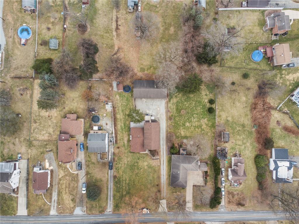 255 Poplar Street Monroeville, PA 15146 - Photo 43 of 44 The extended driveway offers parking for 5+ additional vehicles, making it effortless to store trailers, boats, or guests’ cars without ever feeling crowded. From summer toys to winter equipment, everything has a home here—no off site storage needed.