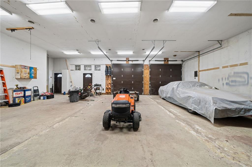 255 Poplar Street Monroeville, PA 15146 - Photo 5 of 44 High ceilings and deep bays in the garage create true flexibility—ideal for storing larger recreational vehicles or setting up dedicated hobby zones.