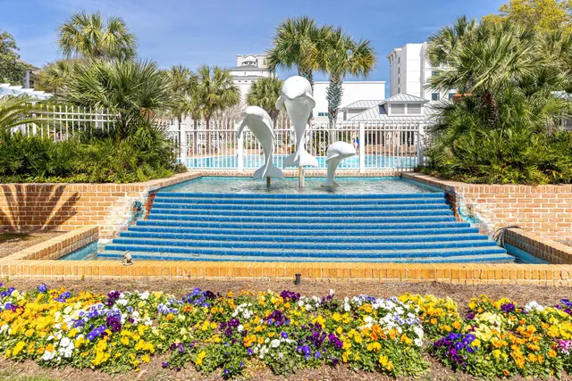 a view of a building with a garden