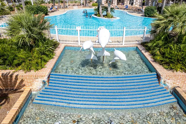 a view of a lake with a big yard