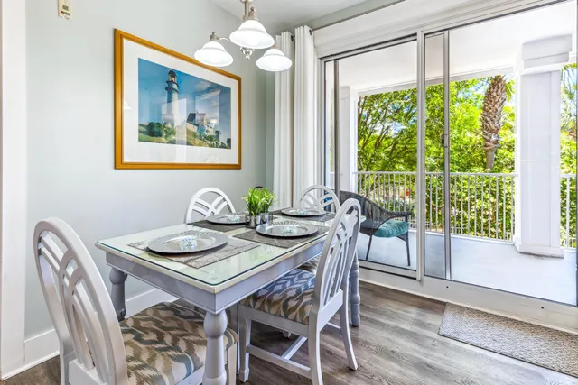 a view of a dining room with furniture window and outside view