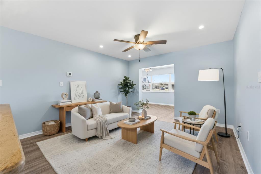 5153 Turquoise Lane, Unit 102 New Port Richey, FL 34652 - Photo 16 of 29 a living room with furniture