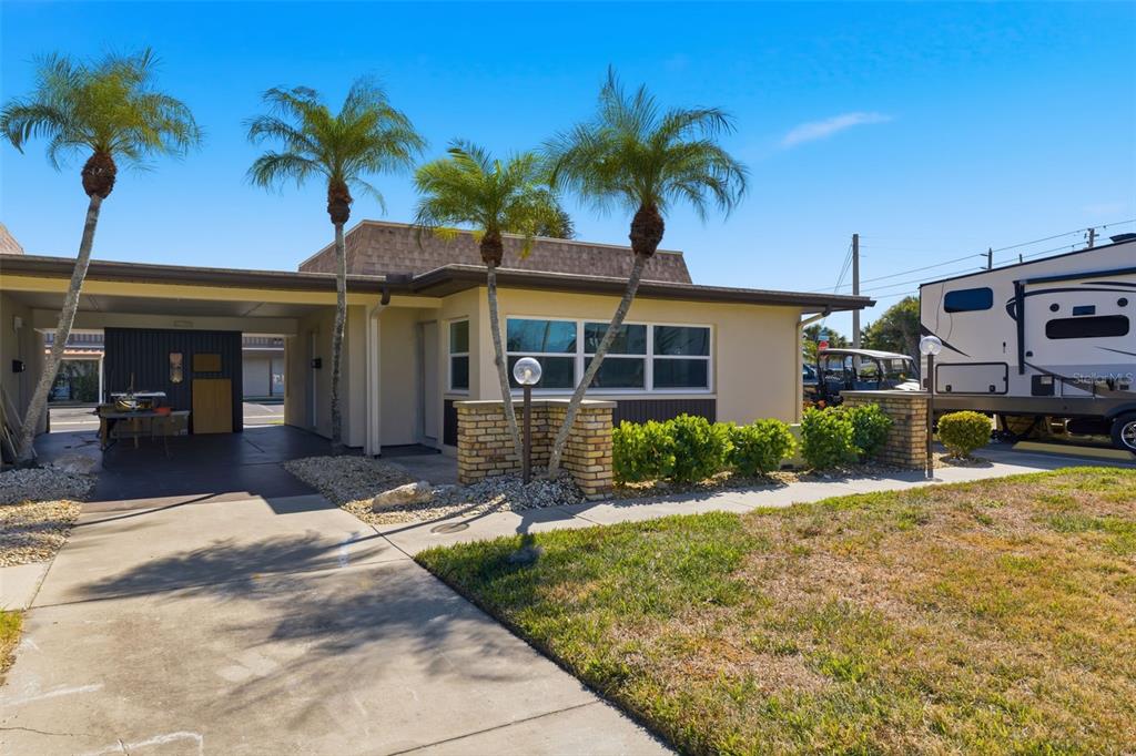 5153 Turquoise Lane, Unit 102 New Port Richey, FL 34652 - Photo 4 of 29 a view of a house with a patio