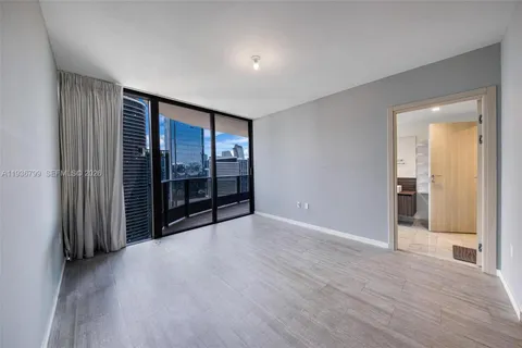 a bathroom with a bathtub and a sink