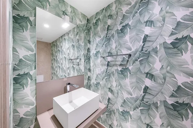 a view of a swimming pool with outdoor seating