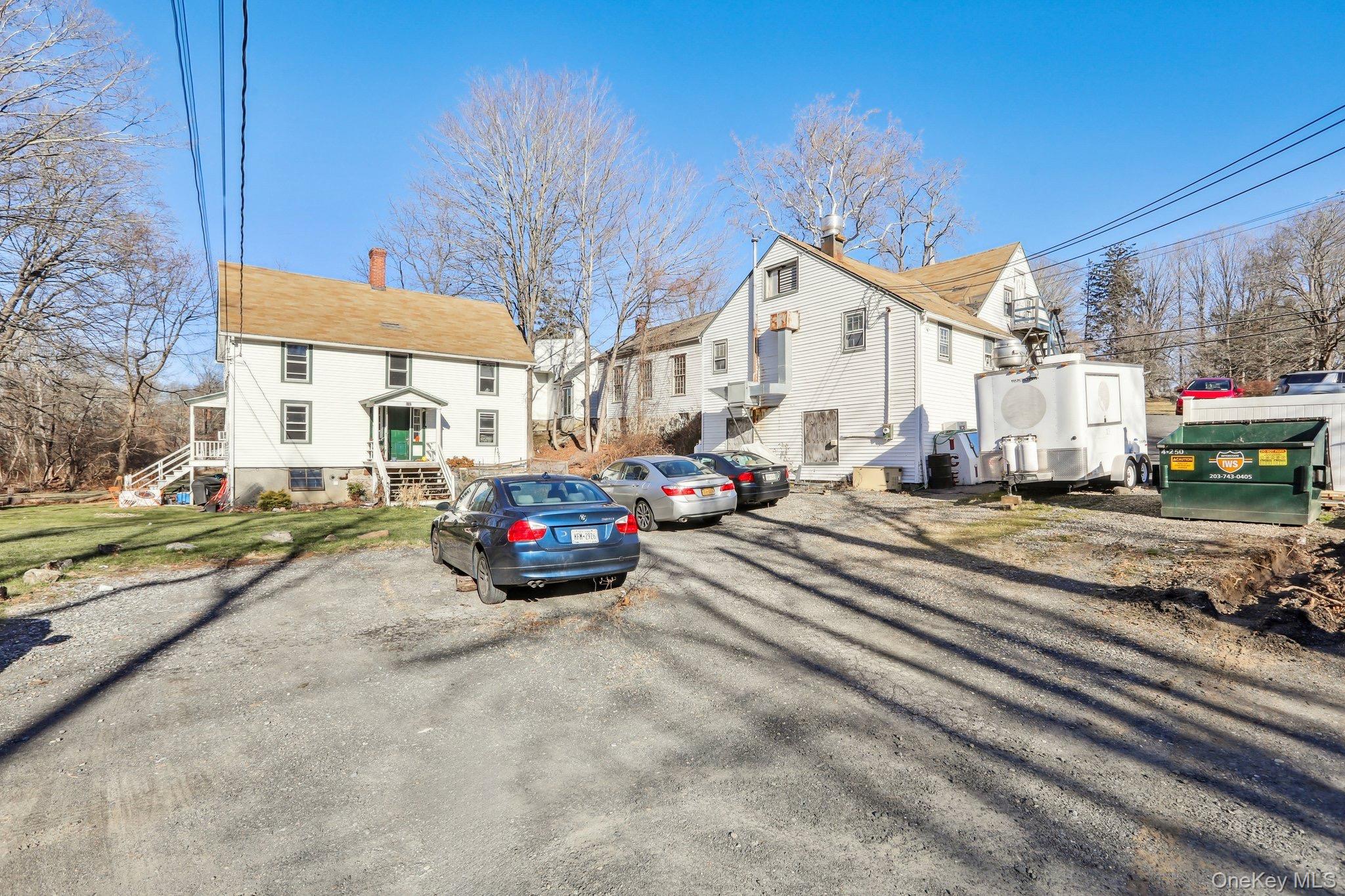 a view of a street with cars on road