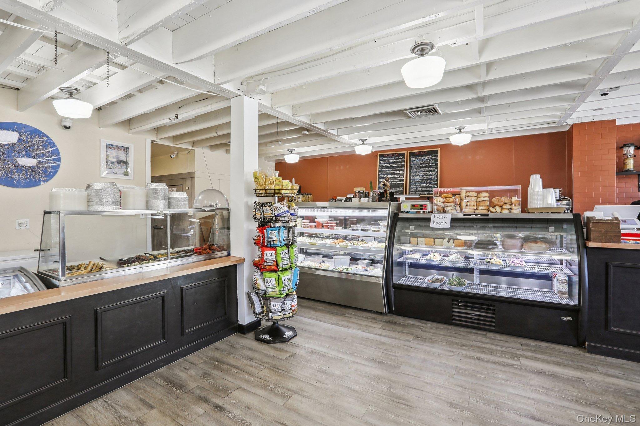 114 Spring Street South Salem, NY 10590 - Photo 8 of 13 a kitchen with stainless steel appliances kitchen island granite countertop a sink and cabinets