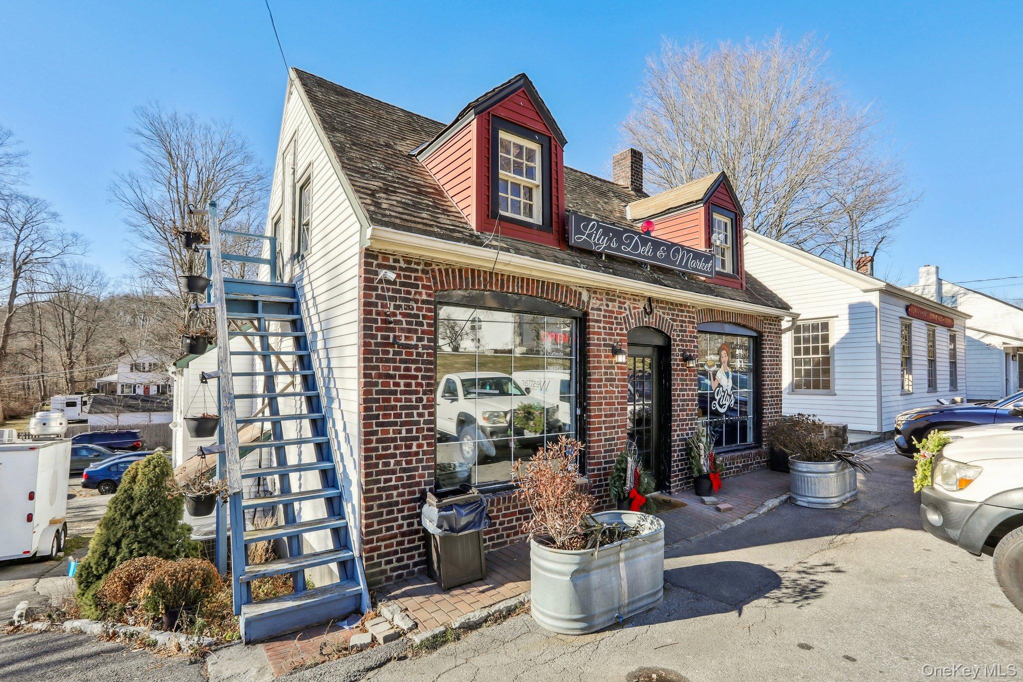 114 Spring Street South Salem, NY 10590 - Photo 10 of 13 a view of a building with potted plants