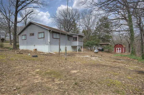 a house view with a outdoor space
