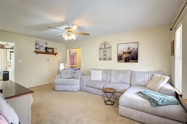 a living room with furniture and a couch