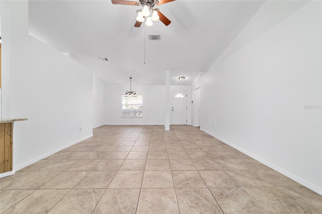 13688 Southwest 113th Lane Dunnellon, FL 34432 - Photo 13 of 70 wooden floor in an empty room