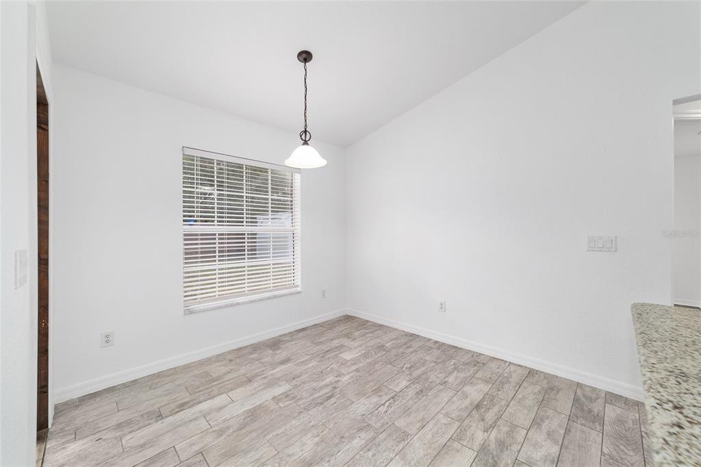 13688 Southwest 113th Lane Dunnellon, FL 34432 - Photo 23 of 70 a view of empty room with windows