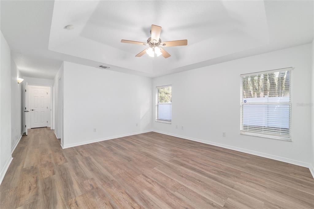 13688 Southwest 113th Lane Dunnellon, FL 34432 - Photo 37 of 70 wooden floor in an empty room with a window