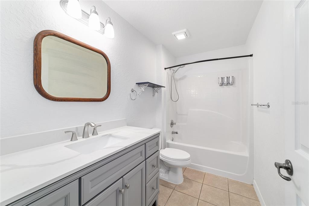 13688 Southwest 113th Lane Dunnellon, FL 34432 - Photo 48 of 70 a bathroom with a sink a toilet and a mirror