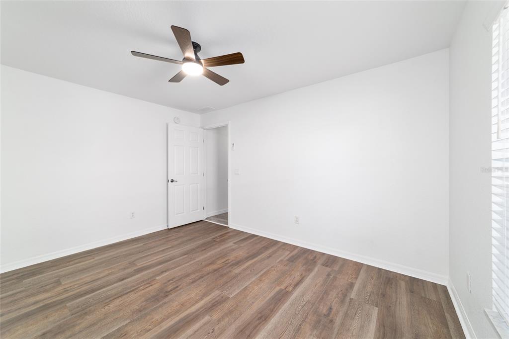 13688 Southwest 113th Lane Dunnellon, FL 34432 - Photo 50 of 70 a view of empty room with wooden floor