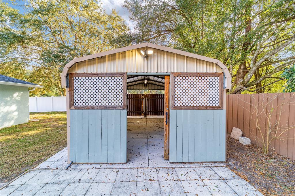 13688 Southwest 113th Lane Dunnellon, FL 34432 - Photo 64 of 70 a backyard of a house