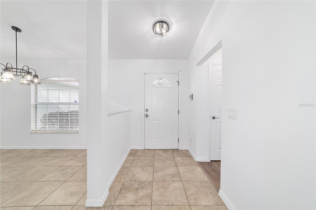 13688 Southwest 113th Lane Dunnellon, FL 34432 - Photo 7 of 70 a view of an empty room with a window