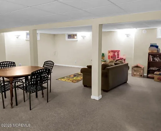 a view of a livingroom with furniture and a livingroom
