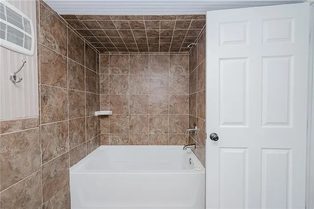 a bathroom with a bathtub