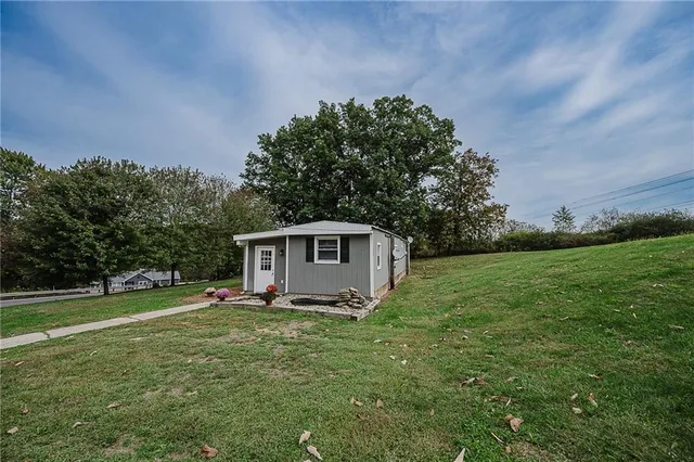 a view of a backyard with a garden