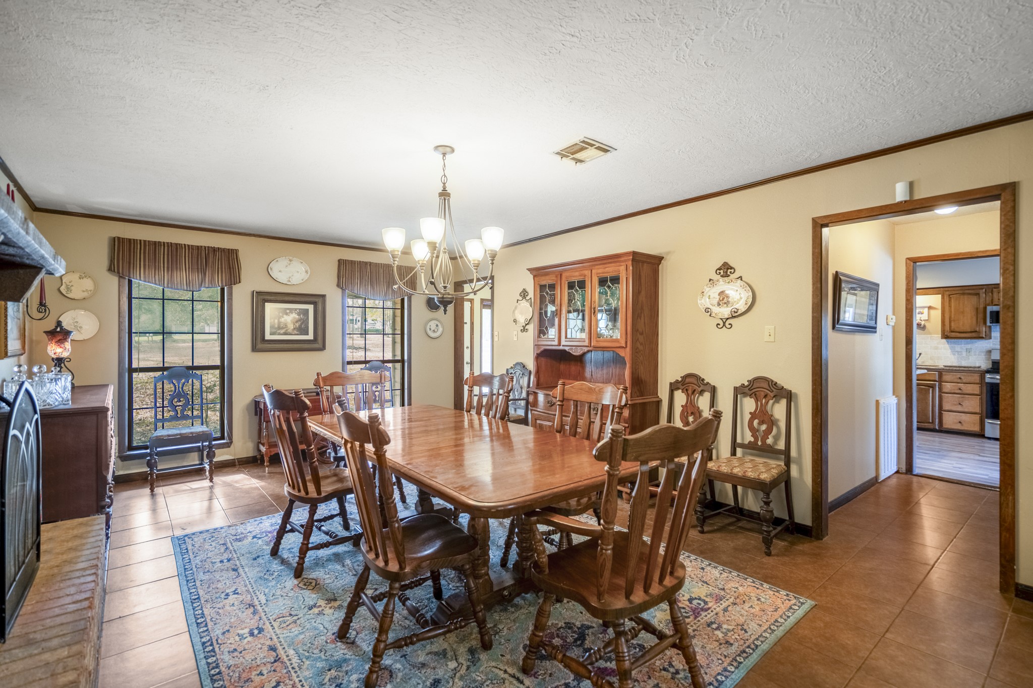 5415 Old Israel Road Livingston, TX 77351 - Photo 9 of 45 Such a stunning dining room with its own fireplace and beautiful views!