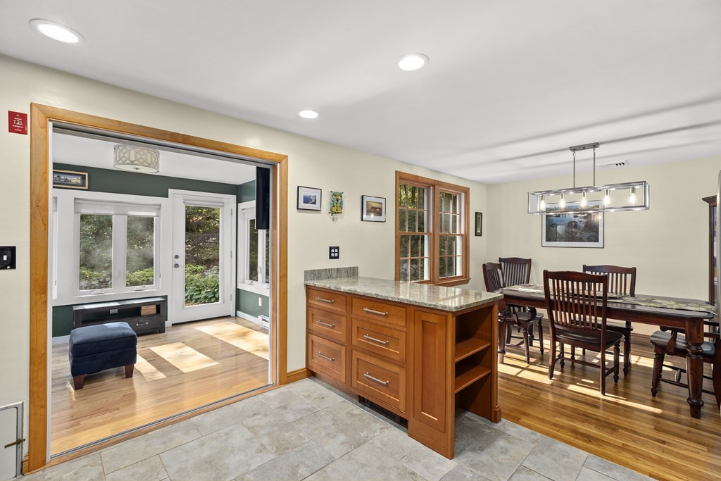 30 Eaton Road Framingham, MA 01701 - Photo 12 of 36 a view of a dining room with furniture window and wooden floor